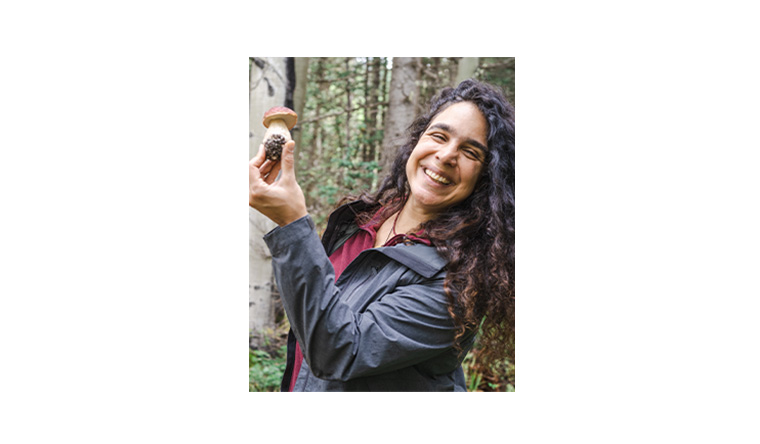 Giuliana Furci holding a fungus