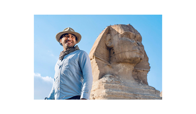 Ramy Romany standing in front of the Great Sphinx of Giza