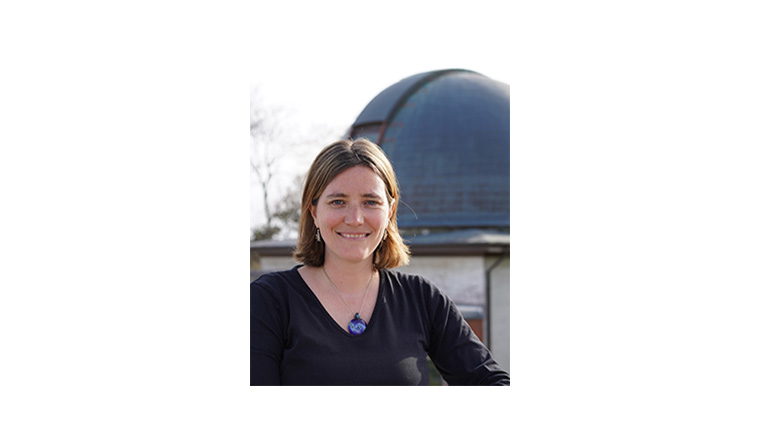 Yvette Cendes stood in front of the Smithsonian Astrophysical Observatory